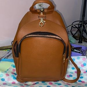 Back back Saddle brown nice size zippers work